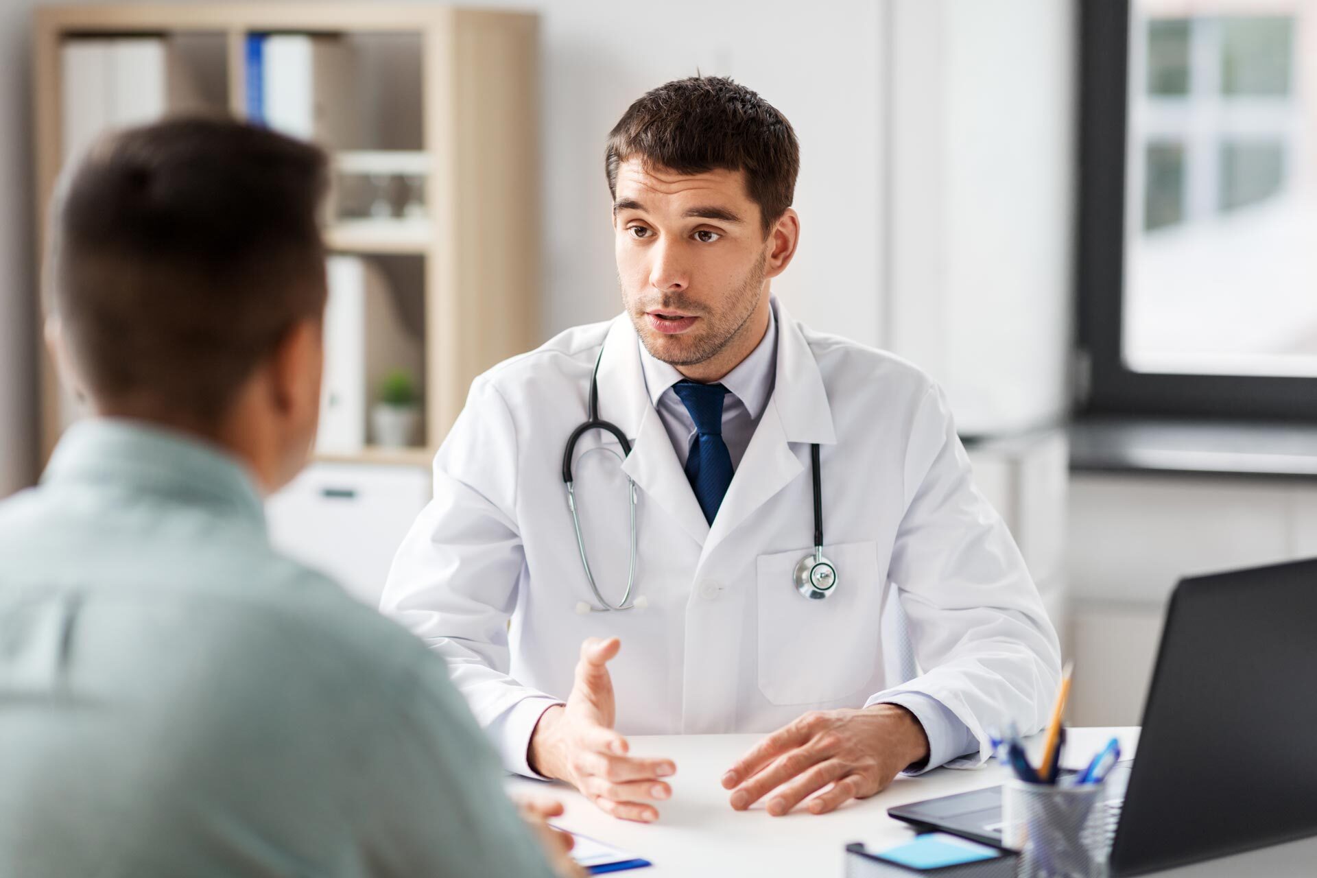 Physician discussing treatment options with patient